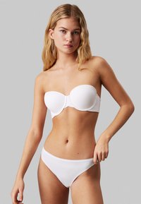 Бюстгальтер на косточках Бюстгальтер на косточках