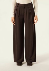 Широкие брюки Широкие брюки