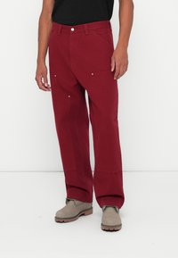 Брюки с накладными карманами Брюки с накладными карманами