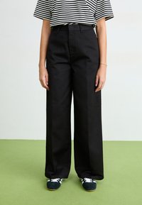 Широкие брюки Широкие брюки