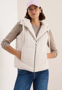 Пуховой жилет Пуховой жилет