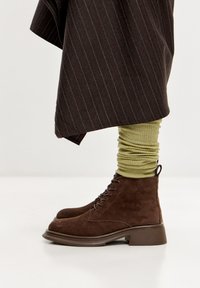 Ботинки на шнуровке Ботинки на шнуровке