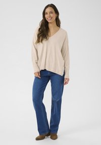 Длинный пуловер Длинный пуловер