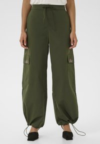 Брюки с накладными карманами Брюки с накладными карманами