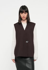 Жилет Жилет