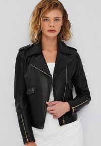 Кожаная куртка Кожаная куртка