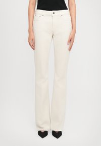 Клешеные брюки Клешеные брюки