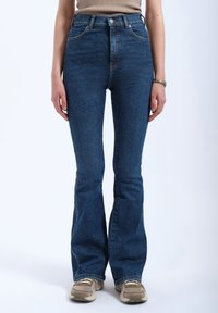 Клешеные брюки Клешеные брюки