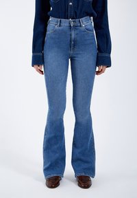 Клешеные брюки Клешеные брюки