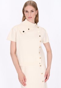 Жилет Жилет