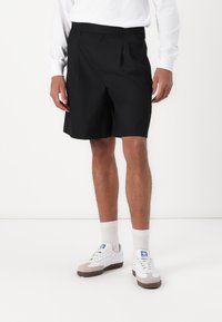 Широкие брюки Широкие брюки