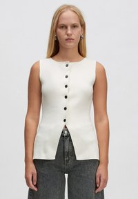 Жилет Жилет