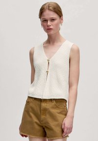 Жилет Жилет