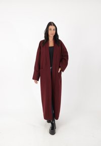 Длинная куртка Длинная куртка