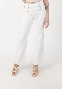 Клешеные брюки Клешеные брюки