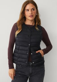 Жилет Жилет