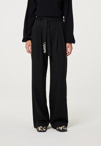 Широкие брюки Широкие брюки