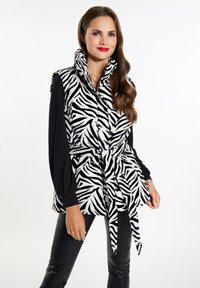 Длинный жилет Длинный жилет