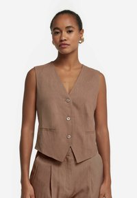 Жилет Жилет