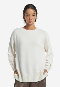 Длинный пуловер Длинный пуловер