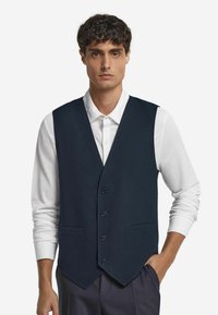 Жилет Жилет