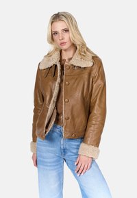 Кожаная куртка Кожаная куртка