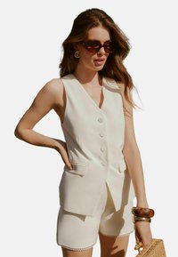 Жилет Жилет