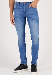 Узкие джинсы Узкие джинсы