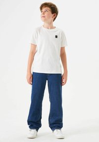 Джинсы Джинсы