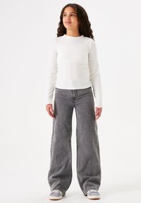 Джинсы Джинсы