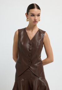 Жилет Жилет