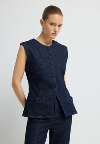 Джинсовая жилетка Джинсовая жилетка