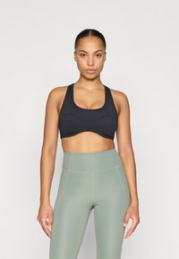 Спортивный бюстгальтер Спортивный бюстгальтер