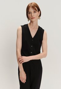 Жилет Жилет