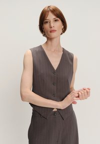 Жилет Жилет