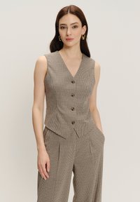 Жилет Жилет