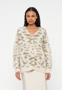 Жаккардовая вязаная кофта Жаккардовая вязаная кофта