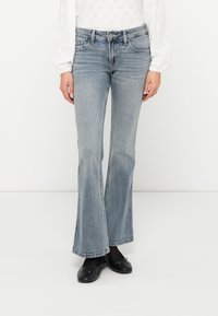 Клешеные брюки Клешеные брюки