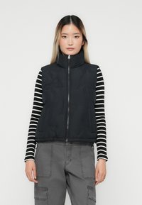 Жилет Жилет