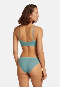 Спортивный бюстгальтер Спортивный бюстгальтер