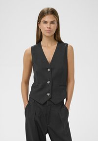 Жилет Жилет