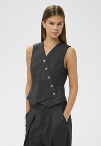 Жилет Жилет