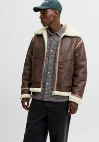 Кожаная куртка Кожаная куртка