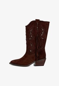 Ковбойские сапоги Ковбойские сапоги