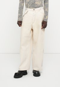 Свободные джинсы Свободные джинсы