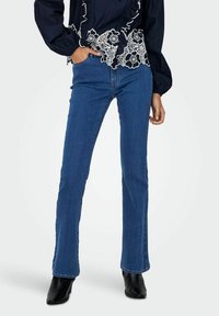 Клешеные брюки Клешеные брюки