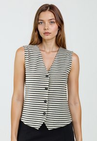 Жилет Жилет