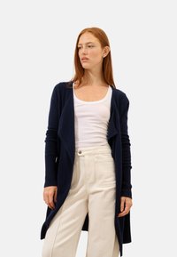 Длинный жилет Длинный жилет