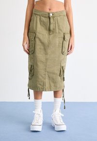 Юбка с накладными карманами Юбка с накладными карманами