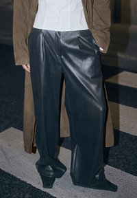 Широкие брюки Широкие брюки